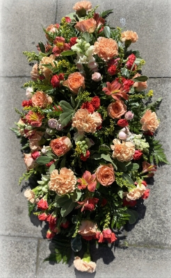 Coffin spray peaches and oranges