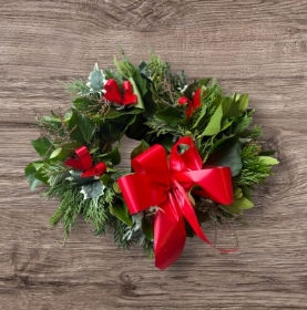 Christmas wreath for Grave with ribbon.