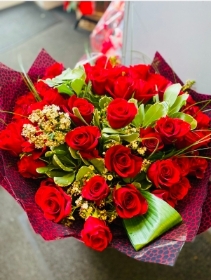 Two dozen (24) red roses